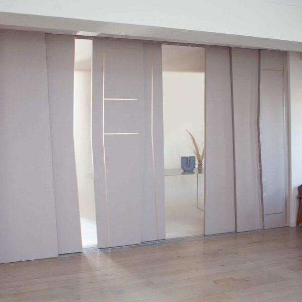 Bespoke sliding doors asymmetrical design in mauve with gold copper decor unique contemporary high end design by jacobsroom