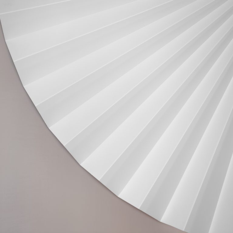 This is the Jeux Wall light designed by jacobsroom studio, Rome. Super light origami folded wall decor made by hand in Italy. White color