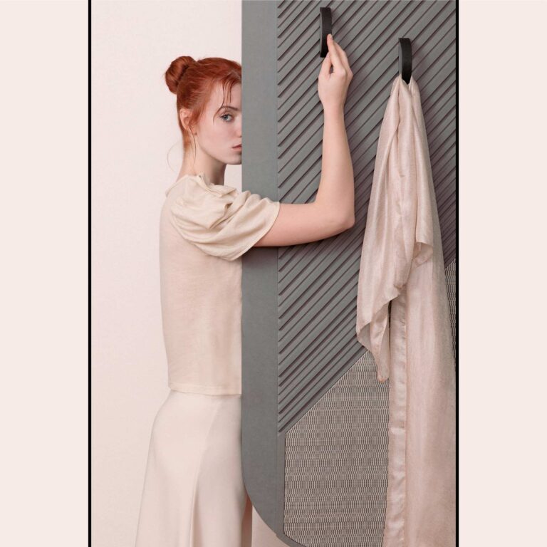 Doors interior decoration of the O wall cabinet with Hermès home decor textile. Sustainable interior design by jacobsroom