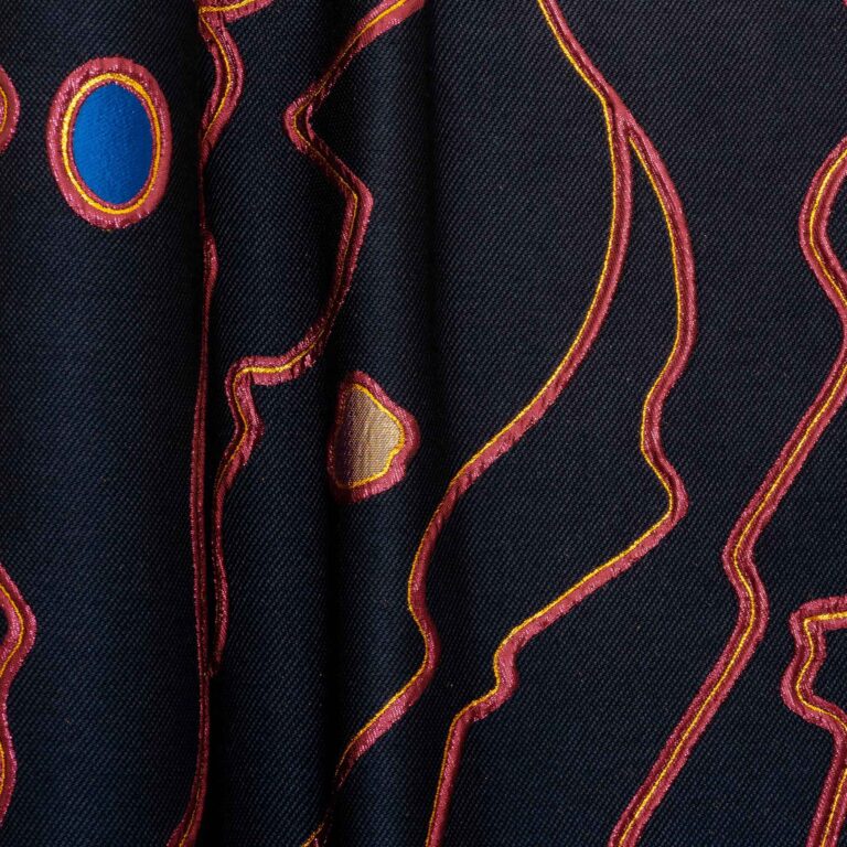 Textile decor in black from the Metaphores Paris Hermes luxury decor line for the ultra modern side table Sourire