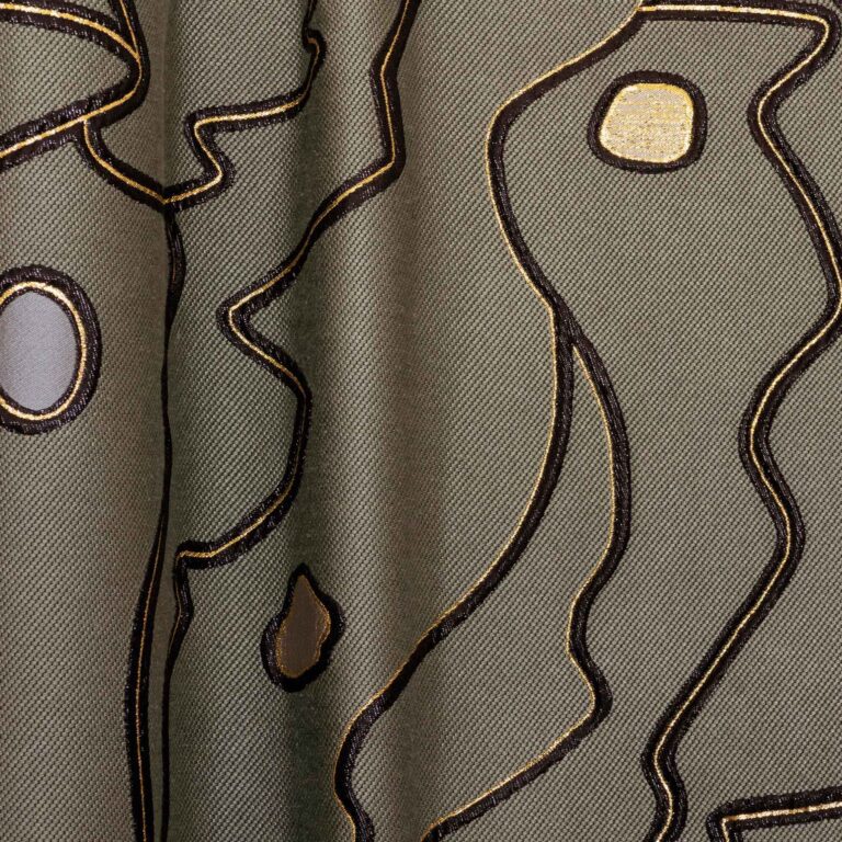 Textile decor in clay color from the Metaphores Paris Hermes interior design brand for the ultra modern side table Sourire