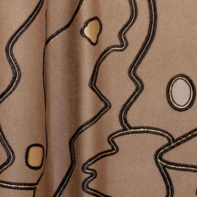 Textile in gold from the Metaphores Paris Hermes interior decor line for the ultra modern side table Sourire